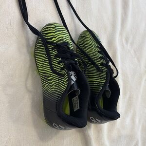 Adidas Black and Greenish yellow soccer cleats size 1